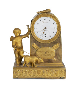 1265.  "Oltramare".Reloj de bronce dorado con putti con perro. Firmado en la esfera.Francia, h. 1820-30.