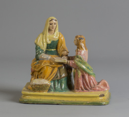 1142.  Santa Ana enseñando a leer a la Virgen.Grupo de cerámica esmaltada.Triana, pp. del S. XX.