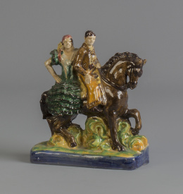 1137.  Grupo a caballo de cerámica esmaltada.Triana, pp. del S. XX.
