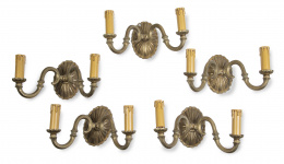 652.  Lote de cinco apliques de dos luces de bronce dorado.ff. del S. XIX - pp. del S. XX.