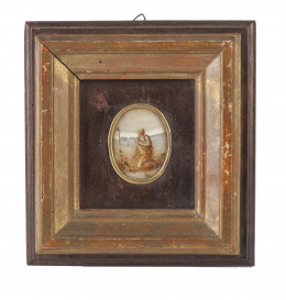 1077.  "Magdalena penitente"Medallón en mármol pintado, con marco en madera tallada y dorada.S. XVIII