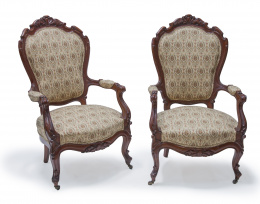 1281.  Pareja de butacas isabelinas en madera tallada.Trabajo español, S. XIX.