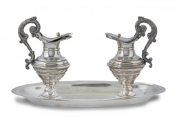 549.  Juego de vinajeras de metal plateado, siguiendo modelos del S. XVIII.Trabajo español, S. XIX.