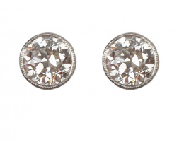 258.  Pendientes dormilonas de brillantes engastados en chatones que suman 1,60 ct