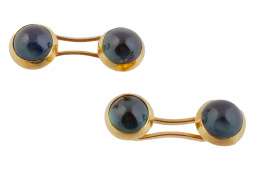 126.  Gemelos dobles Art-Decó con cabuchones de turmalinas en marco de oro