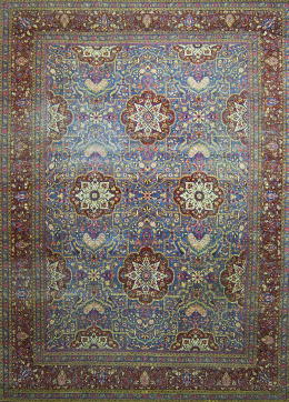 928.  Alfombra persa de campo rojo con campo azul y medallones con flores.S. XX.