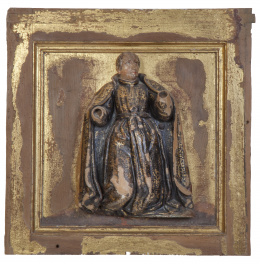 580.  Santo en relieve en madera tallada y policromada.Sobre panel en madera tallada y dorada.Trabajo español, S. XVIII. 