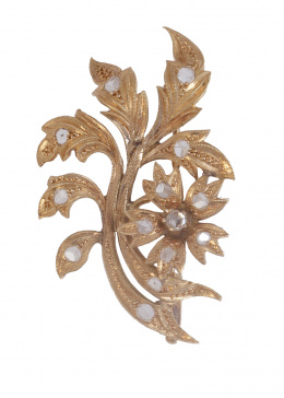 30.  Prog. 67788 . Broche S. XIX de diamantes con diseño de rama con flor y hojas
