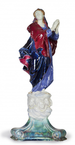 1059.  Karin Jarl-Sakellarios (Viena, 1885 - 1948) para la casa Goldscheider.Virgen en cerámica esmaltada.Trabajo austriaco, primera mitad del S. XX.