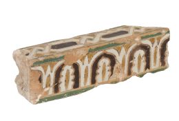 599.  Alizar de cerámica de cuerda seco, esmaltada en negro, blanco y verdeToledo, S. XV