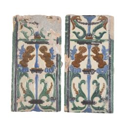 574.  Dos azulejos de cerámica de arista esmaltada en azul, melado y verde con decoración a "candeleri".Sevilla, S. XVI.