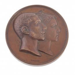 308.  Medalla en bronce conmemorativa de la boda de Alfonso XII con María de las Mercedes de Orleans. 1878