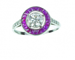 84.  Sortija Art-Decó ojo de perdiz con brillante central de 0,40 ct orlado de rubíes calibrados