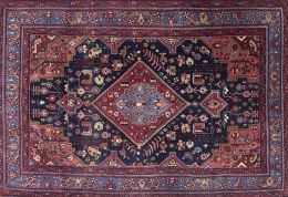 480.  Alfombra en lana de campo azul y flores.