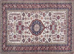 568.  Alfombra en lana de campo blanco y motivos vegetales geométricos.