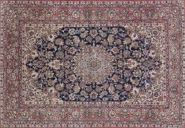 594.  Alfombra en lana en rojo y azul con decoración de flores y medallón central.Persia.