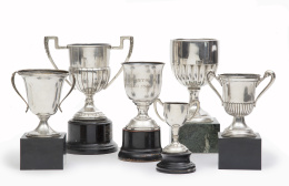 1274.  Lote de seis trofeos de golf de plata.
S. XX.