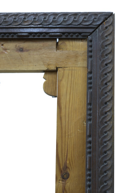 1312.  Marco de madera tallada con trenzado.
S. XX.