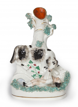 716.  Spaniel jugando con niño.Florero de loza esmaltada.Staffordshire, Inglaterra, ff. del S. XIX.