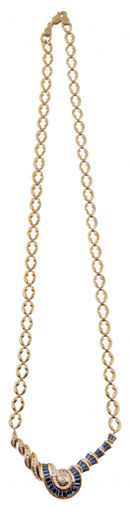 283.  Collar con centro de zafiros calibredos y brillantes a modo de caracol