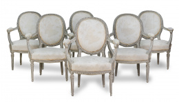 573.  Lote de seis sillas de brazos de estilo Luis XVI de madera tallada y lacada. S. XX.
