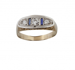 71.  Sortija Art Decó con tres brillantes entre zafiros talla baguette