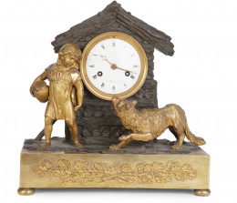968.  Reloj de bronce dorado y patinado simulando una cabaña con perro y niño.Francia, h. 1830-40.