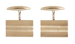 226.  Gemelos rectangulares con banda central de líneas sinuosas grabadas