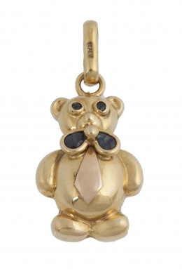 196.  Colgante en forma de osito con zafiros en ojos y lazo