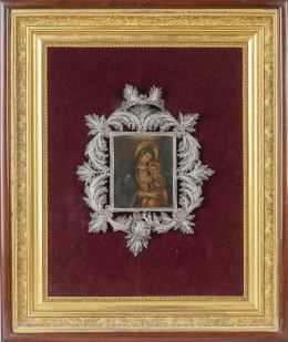 1144.  Benditera en filigrana de plata con cobre en el centro con la Virgen del Pópolo.S. XVIII.
