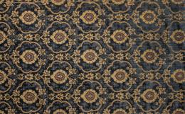 1214.  Dos fragmentos de brocado en terciopelo azul con decoración de flores.S. XIX.