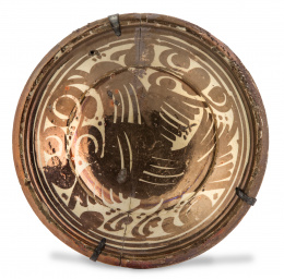 1107.  Plato en cerámica de reflejo metálico con "pardalot".Manises, S. XVII.
