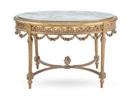 674.  Velador de estilo Luis XVI en madera tallada, estucada y dorada con tapa de mármol.Trabajo español, h. 1900.