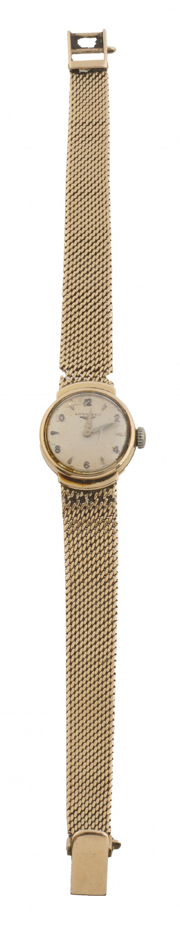 344.  Reloj Longines de pulsera en oro para señora años 50