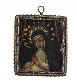 1101.  Relicario con marco de hierro con Virgen de la Paloma y Cristo en el reverso, S. XVIII. 