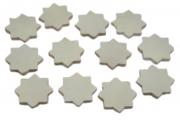 1117.  Conjunto de doce azulejos de cerámica vidriada de blanco con forma de estrella.Teruel, S. XIV.