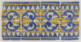 594.  Panel de ocho azulejos de cerámica esmaltada en azul cobalto y amarillo.Portugal, S. XVII.
