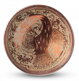 1226.  Plato acuencado de cerámica de reflejo metálico con "pardalot".Manises, S. XVIII.