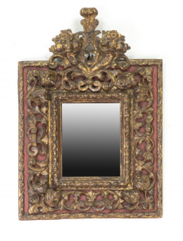 368.  Espejo barroco de madera tallada, dorada y policromada.Trabajo español, S. XVII.