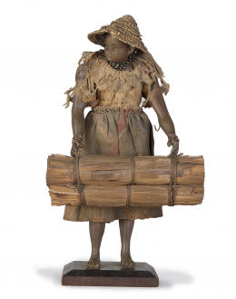 726.  "Campesina"Figura en cera, con indumentaria original.Filipinas, S. XIX.