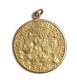 389.  Moneda doble Excelente de Sevilla en oro con marco