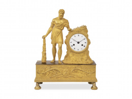 1127.  Reloj en bronce dorado, con la figura de Hércules, sobre plinto.Francia, primera mitad del S. XIX.