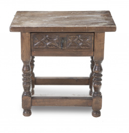 502.  Bufetillo de madera de nogal con cajón tallado.Trabajo español, h. 1900.