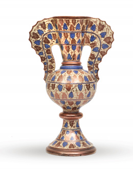 450.  "Vaso de la Alhambra" de cerámica esmaltada en reflejo metálico y azul de cobalto, decorado con hojas de parra.España, ff. del S. XIX