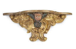 515.  Ménsula de madera tallada, policromada y dorada con cabeza de querubín.S. XVII.