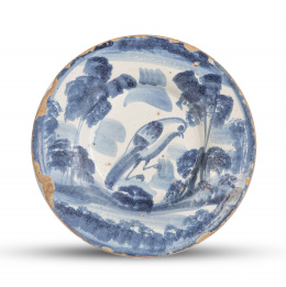 509.  Plato de cerámica esmaltada en azul de cobalto con pajarito.Teruel, S. XVIII.