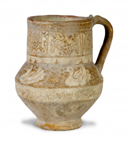 1145.  Jarra de cerámica de reflejo dorado con escritura árabe.Persia, S. XII-XIII.