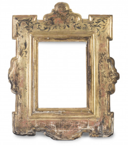 989.  Marco en madera tallada y dorada con restos de policromía.Trabajo español, S. XVII - XVIII. 