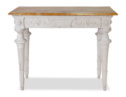 1101.  Consola de estilo Luis XVI de madera tallada y pintada de blanco con tapa de mármol.Trabajo italiano, pp. del S. XIX