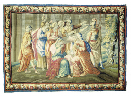 1088.  Tapiz en lana con escena narrrativa enmarcada por cenefa de hojas. Firmado M.R. D´Aubusson.Manufactura real de Aubusson, Francia, S. XVIII.